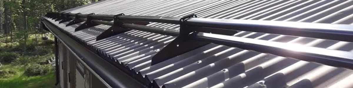 sbk-kattoturva-lumieste-960